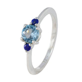 Lili silver ring with round light blue center stone and two small dark blue accents colorful stackable rings for women